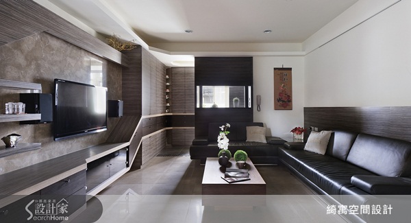 綺寓空間設計利用深色沉穩的木作搭配簡潔線條的設計,