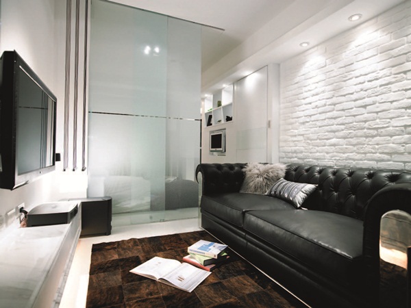 原為1房1廳的小坪數空間，設計師將原本的隔間牆拆除，