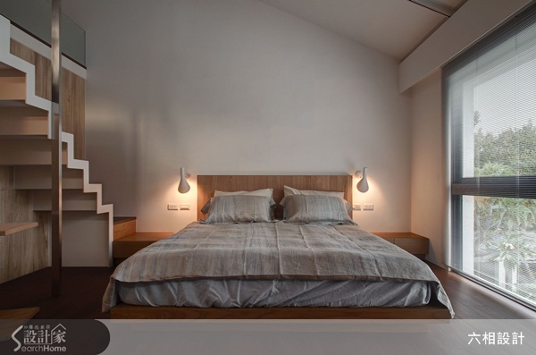 設計師將舊料回收重新運用在壁面的飾材、餐桌和邊几上