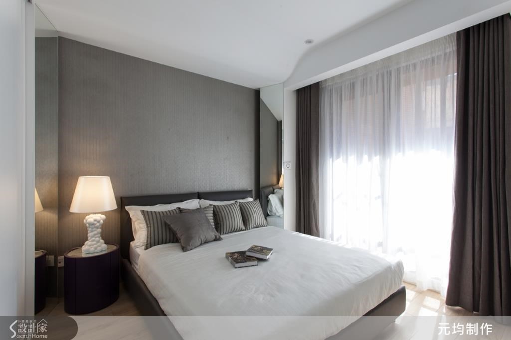 另一間臥房則以高雅的紫色為主軸，搭配進口壁紙，挹注居家質感。