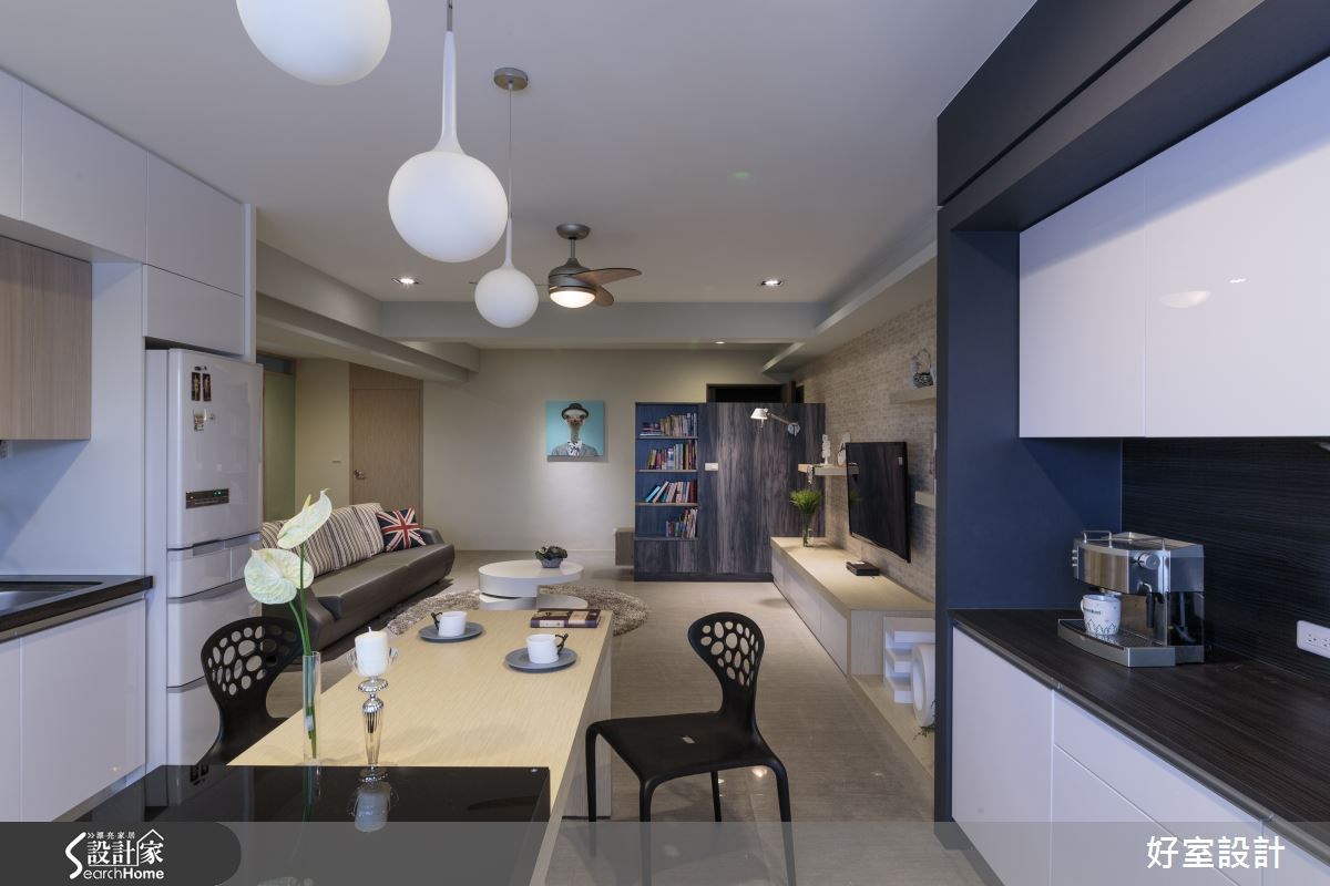 來到高雄市前金區的 35 坪居宅，設計師透過色彩搭配，