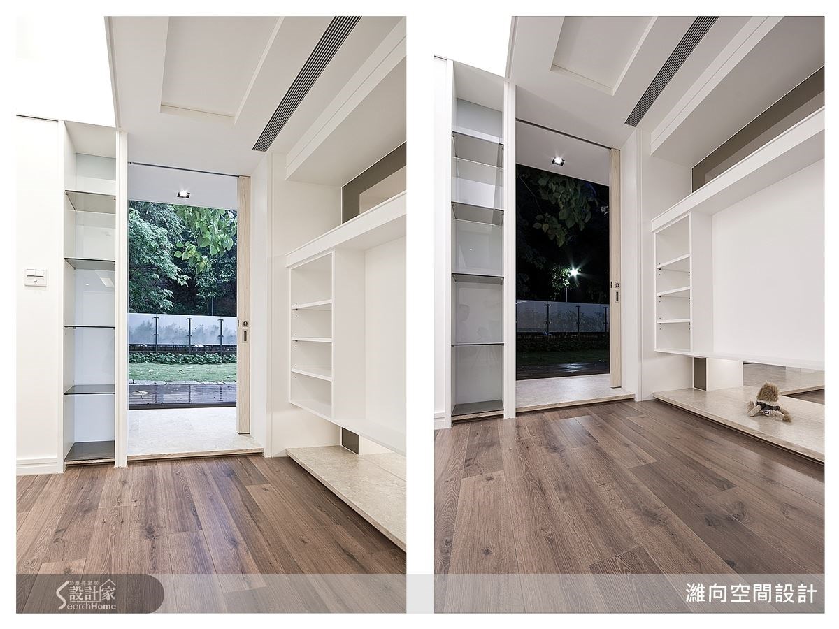 針對門邊的狹長空間,設置有收納櫃體,讓收納技巧更靈活;結合戶外陽台綠景,創造出日夜都動人的端景之美。 針對門邊的狹長空間,設置有收納櫃體,讓收納技巧更靈活;結合戶外陽台綠景,創造出日夜都動人的端景之美。