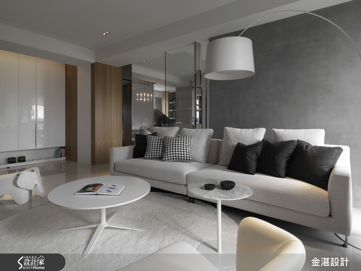 以迎合屋主的沉穩調性作為設計主軸， 40 坪的空間去除