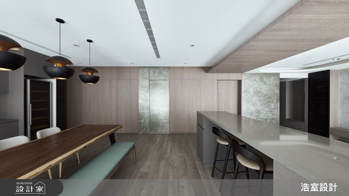 單身男屋主居住的38坪的新成屋，選用黑、白、灰及木質
