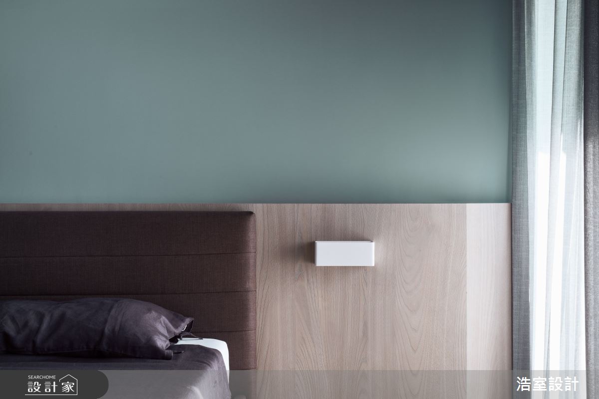 單身男屋主居住的38坪的新成屋，選用黑、白、灰及木質