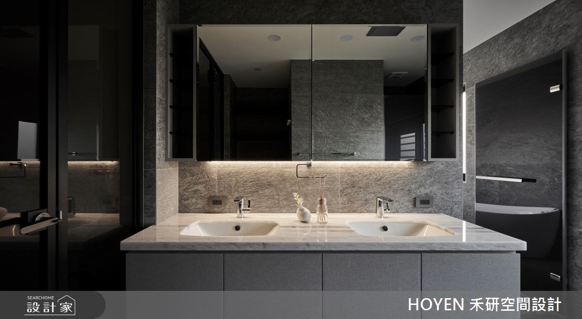 150 坪的現代風透天別墅，以大石材、鍍鈦金屬與各式玻