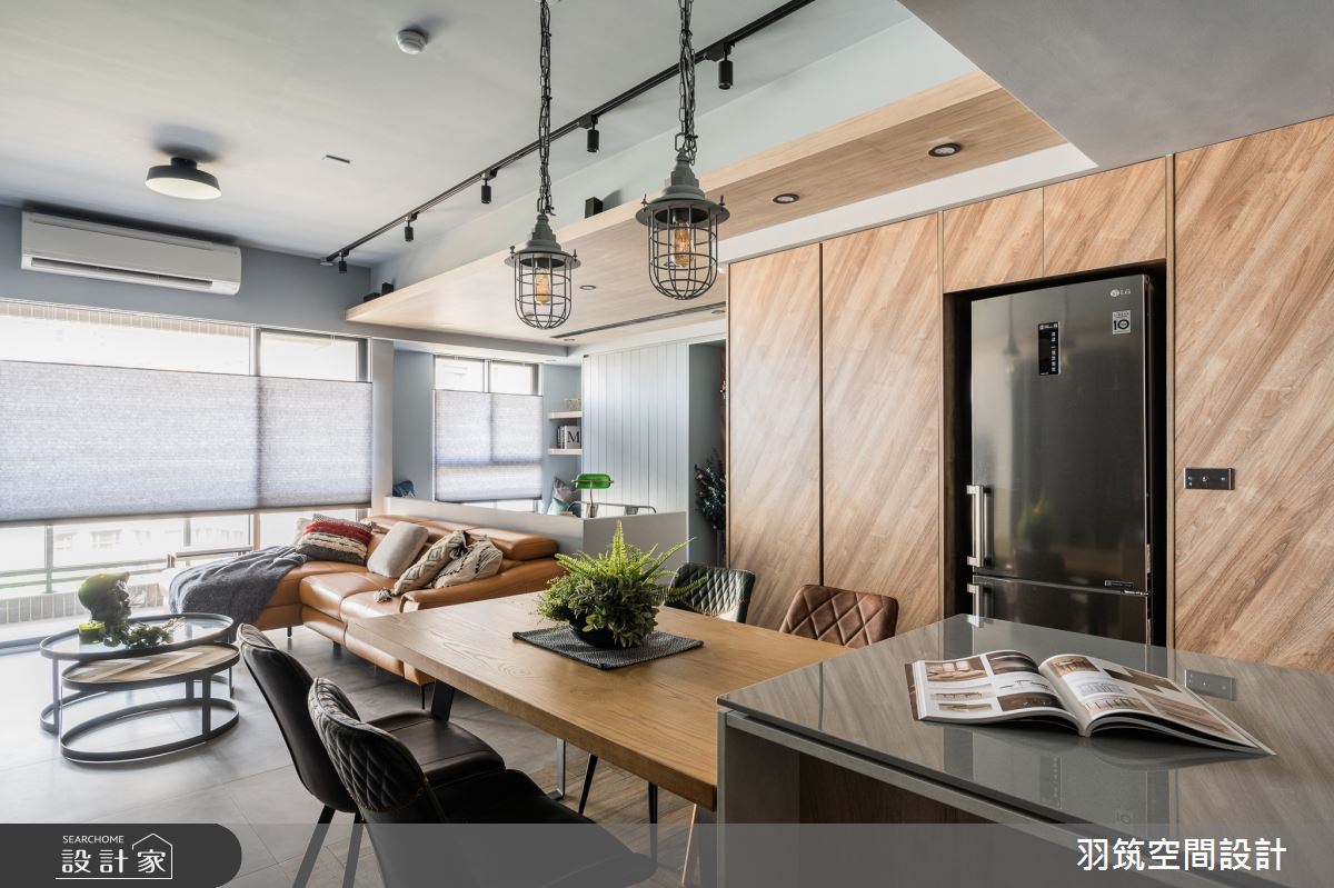 大面落地窗引入戶外暖陽，提升整體空間明亮度，替工業