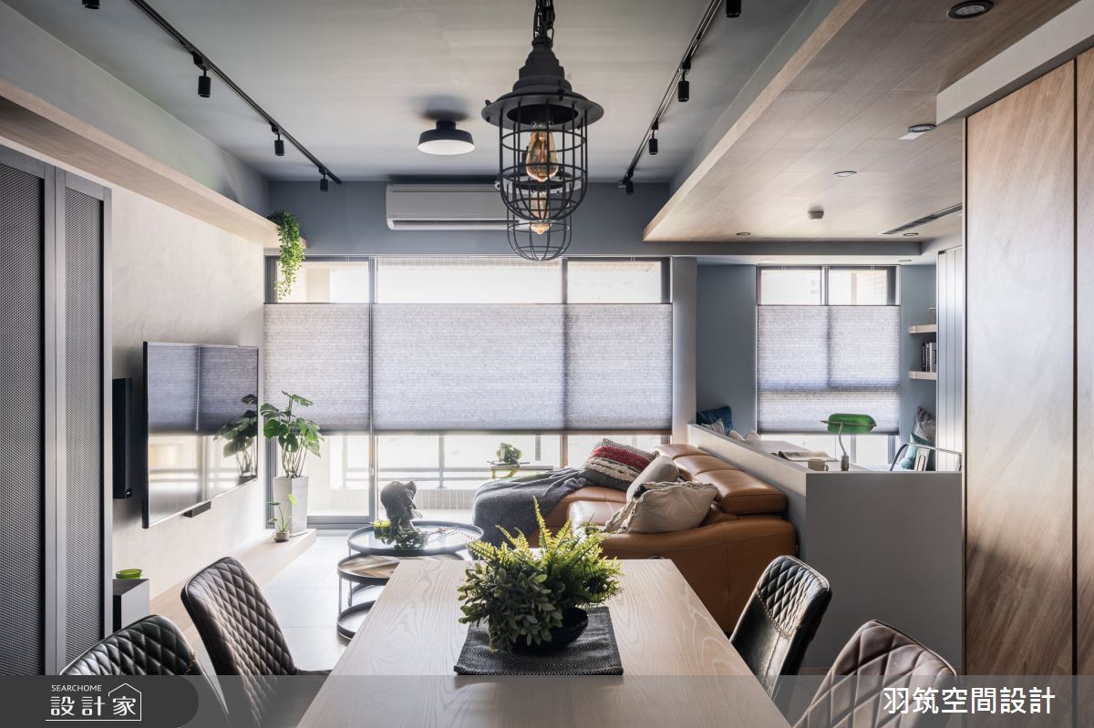 大面落地窗引入戶外暖陽，提升整體空間明亮度，替工業