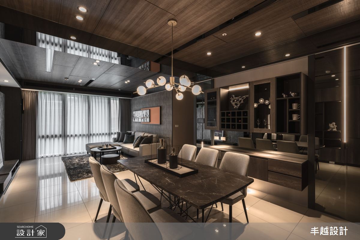 深灰色調為主的 23 坪空間，不免讓人聯想到都會現代風