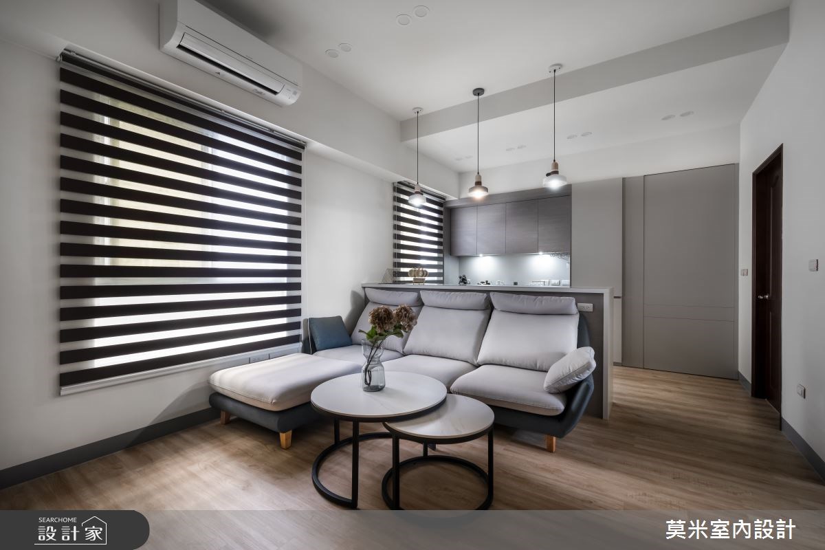 採用開放式設計的 25坪簡約宅，以溫潤木質和灰調為色