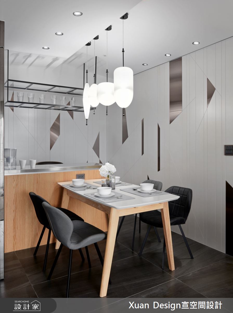 25坪現代風空間裡,透過超耐磨木地板、石材、拋光石英