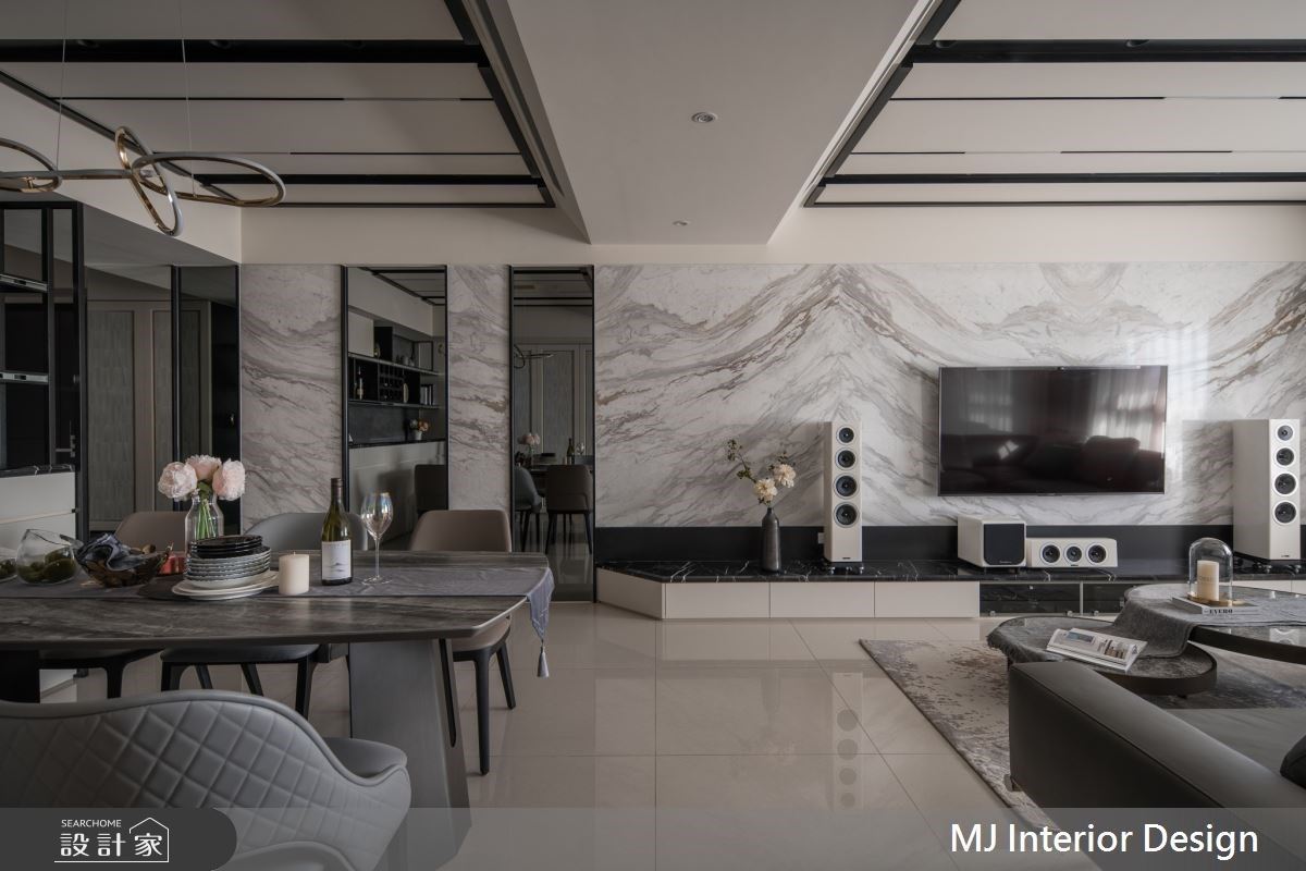 以現代風作為設計主軸，以大面積白色襯底，透過多元化