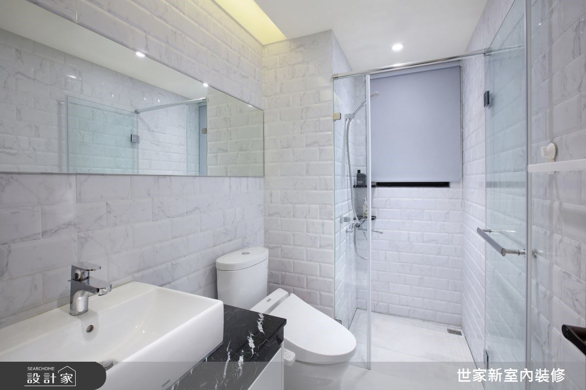 以時尚黑白色調為主軸的 39 坪混搭風住宅，設計師將屋