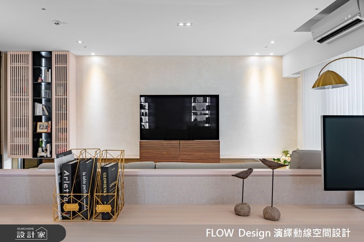 電視牆以特殊塗料取代石材,堆砌空間的精緻度、高級感。