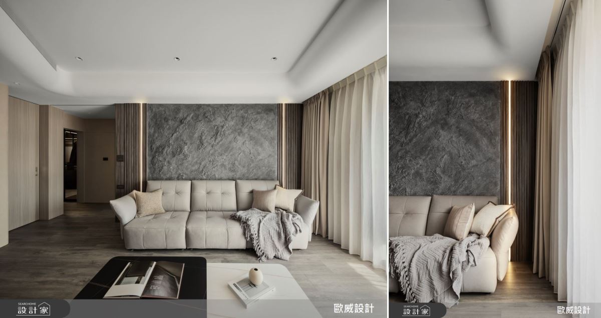 仿山巖的沙發背牆,純手工藝術牆面,形成不對稱的立面,與兩側格柵融入溫潤的自然氣息,立體感強,成為空間主視覺。