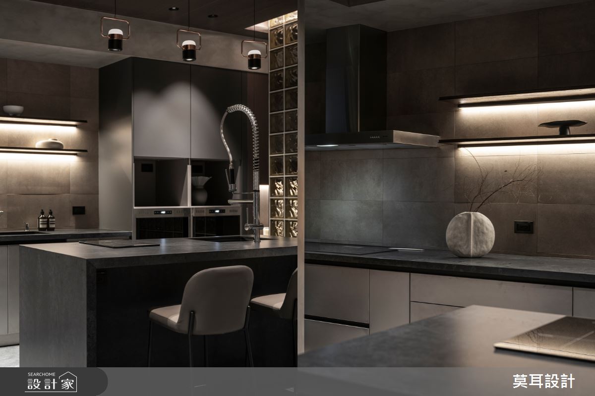 板岩石紋感的石英石中島檯面、水泥地板、不鏽鋼收拉櫃,充滿男性色彩。