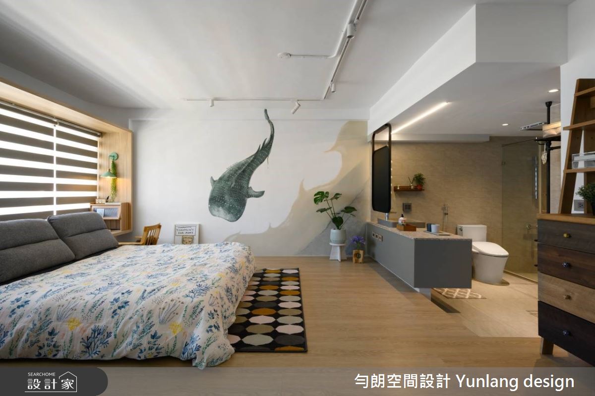 設計師親自手繪牆面,打造私人空間的主題牆。