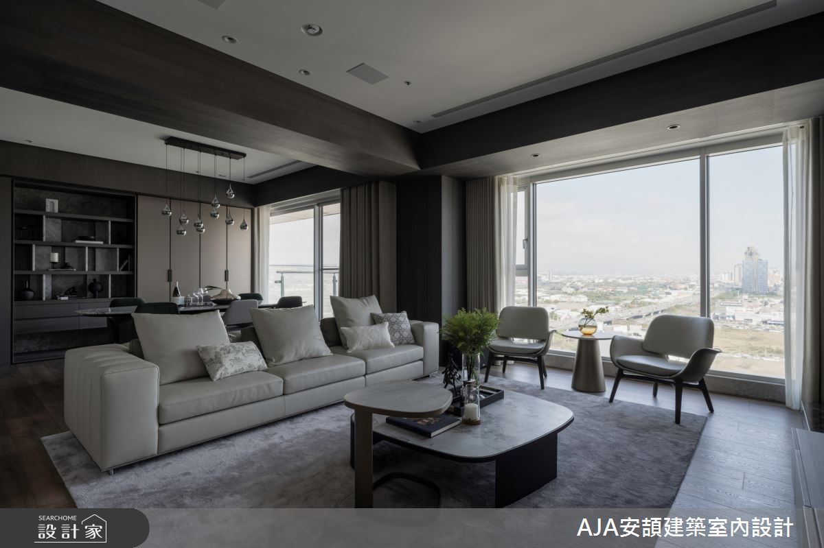 材質延伸天地壁,並以落地窗引入台中七期景觀,空間通透又寬敞。
