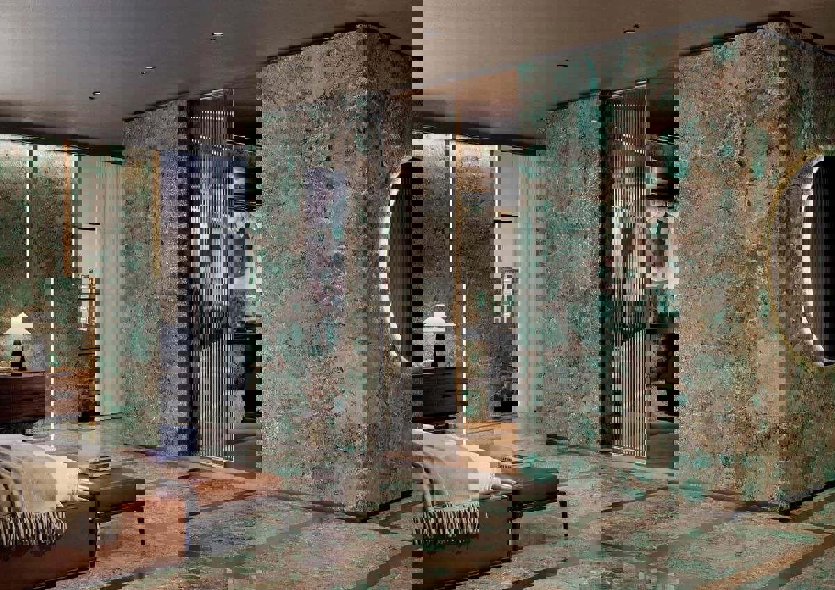 鈦鋼石含有與花崗石相似的原料,呈現天然石紋質感,吸水率遠低於大理石,不易吃色,經高溫高壓製程,莫氏硬度達7–8,具耐刮、耐磨、耐高溫特性,是兼具美感與實用性的理想選擇。圖片提供_佳聯石業 CHIA LIEN STONE。。