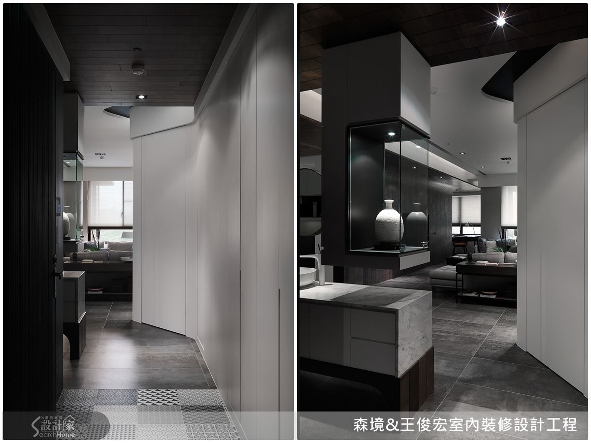 玄關以弧線造型建立獨立儲藏室,既是屏風意象化解穿堂煞風水,同時滿足收納需求。 玄關以弧線造型建立獨立儲藏室,既是屏風意象化解穿堂煞風水,同時滿足收納需求。