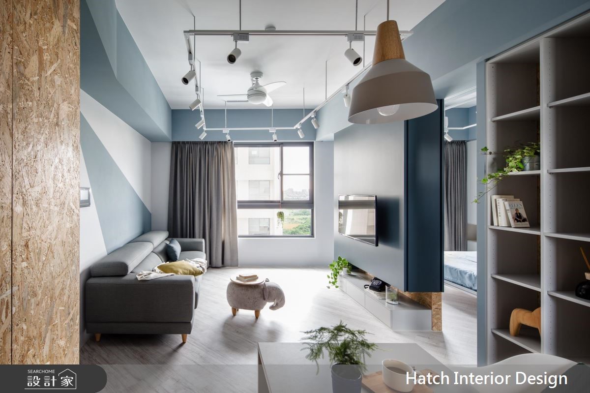 這間 20 坪的 Loft 風小宅,採用回字型格局規劃,並以