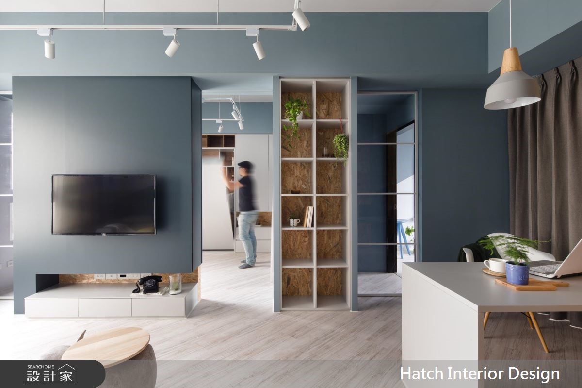這間 20 坪的 Loft 風小宅,採用回字型格局規劃,並以