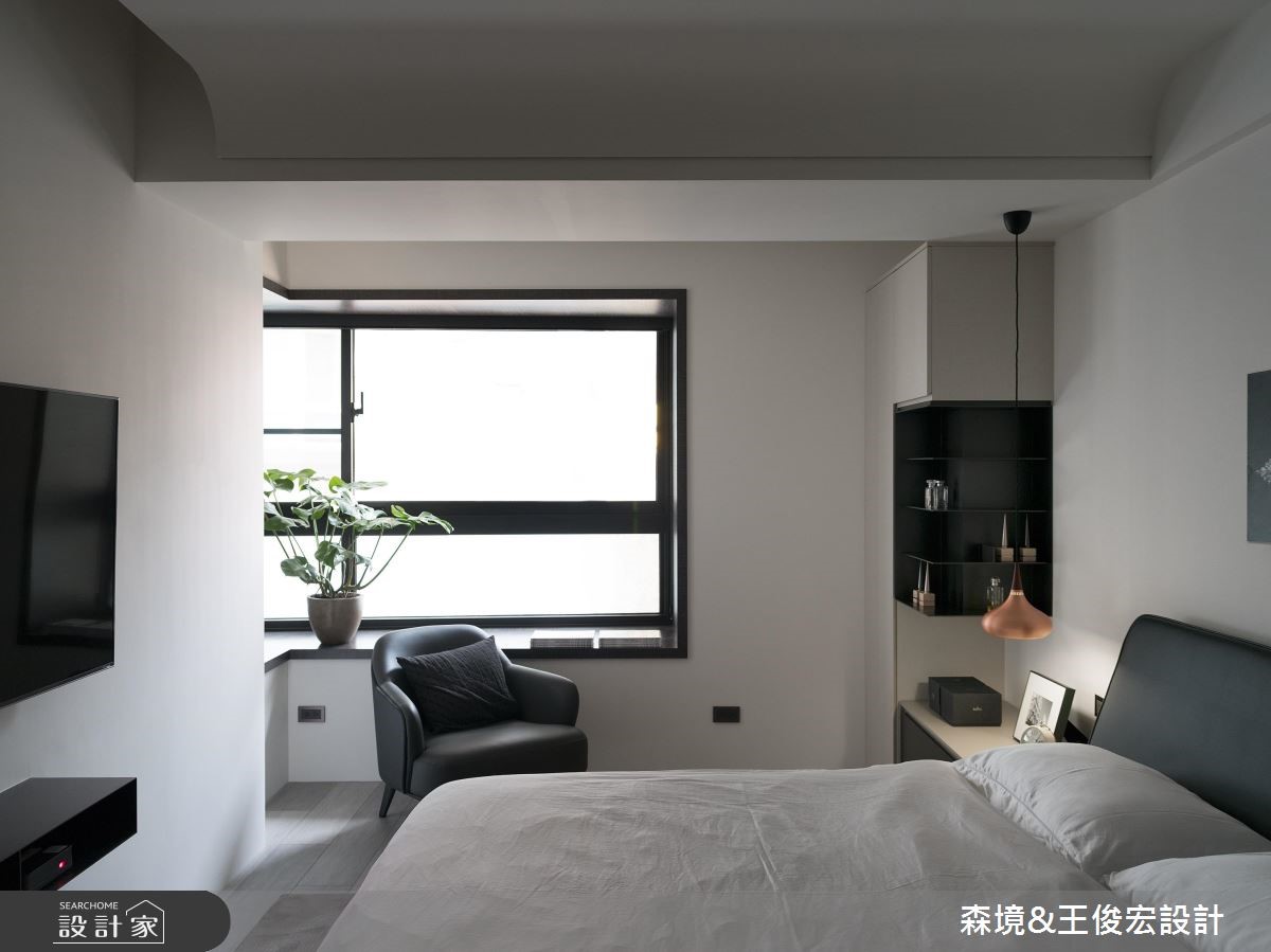 40 坪現代風住宅,透過沉穩深色木紋與質樸石材鋪敘內