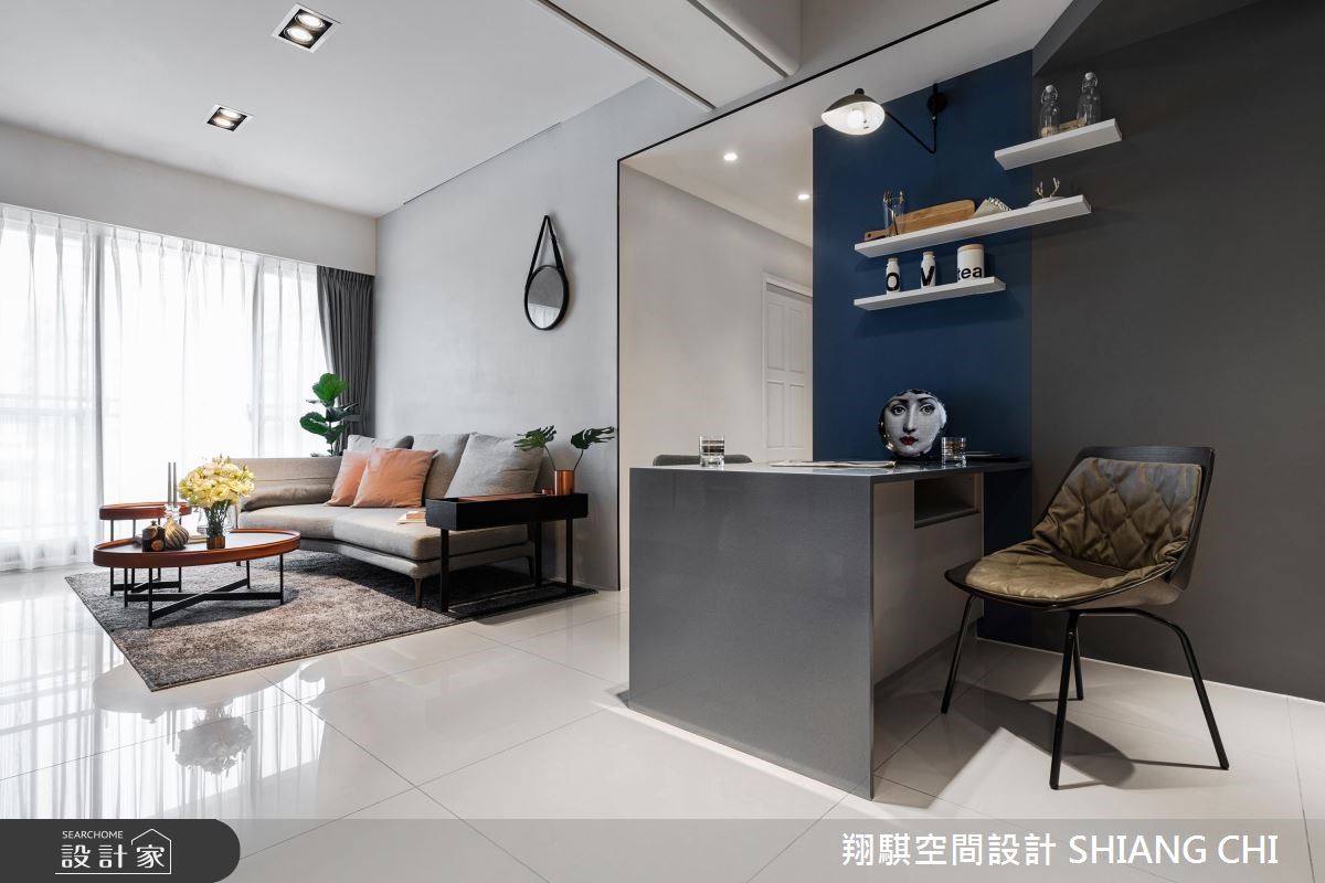 26 坪現代風居家,採以深灰色為背景,搭配輕柔的軟裝