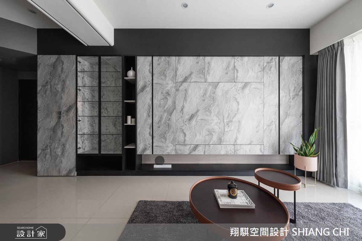 26 坪現代風居家,採以深灰色為背景,搭配輕柔的軟裝