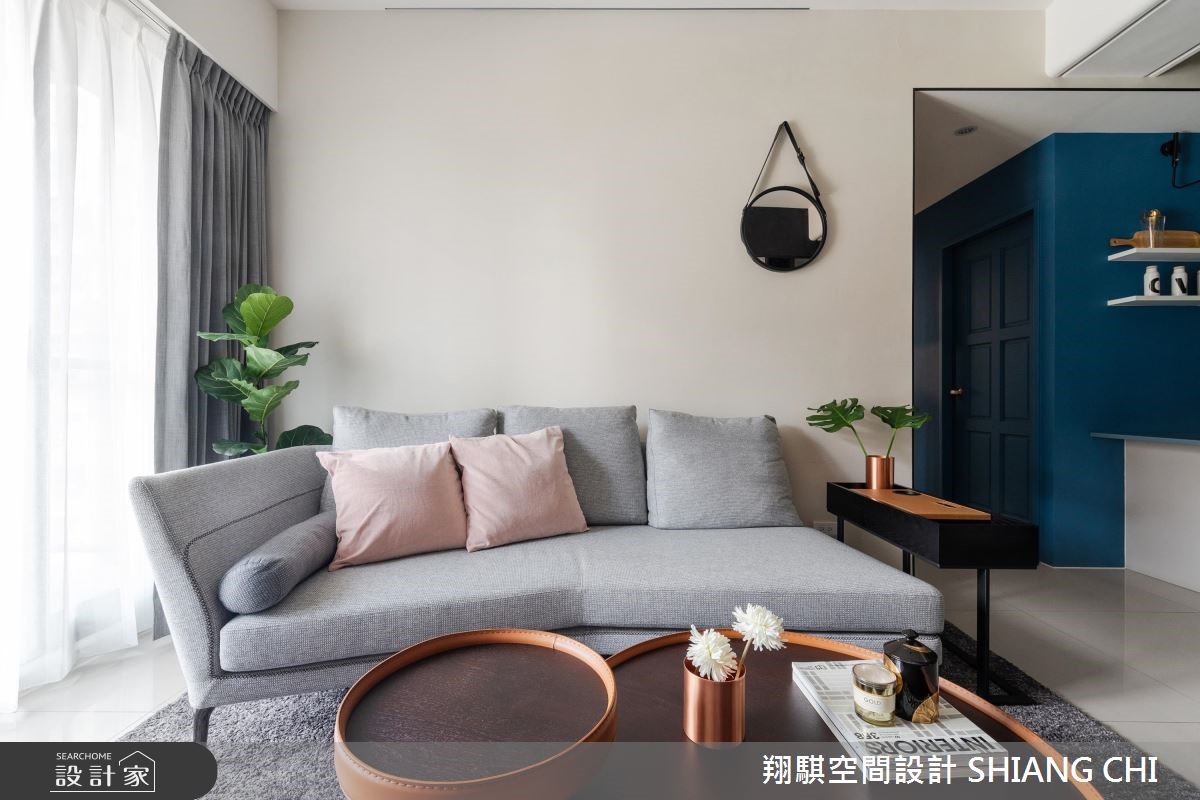 26 坪現代風居家,採以深灰色為背景,搭配輕柔的軟裝