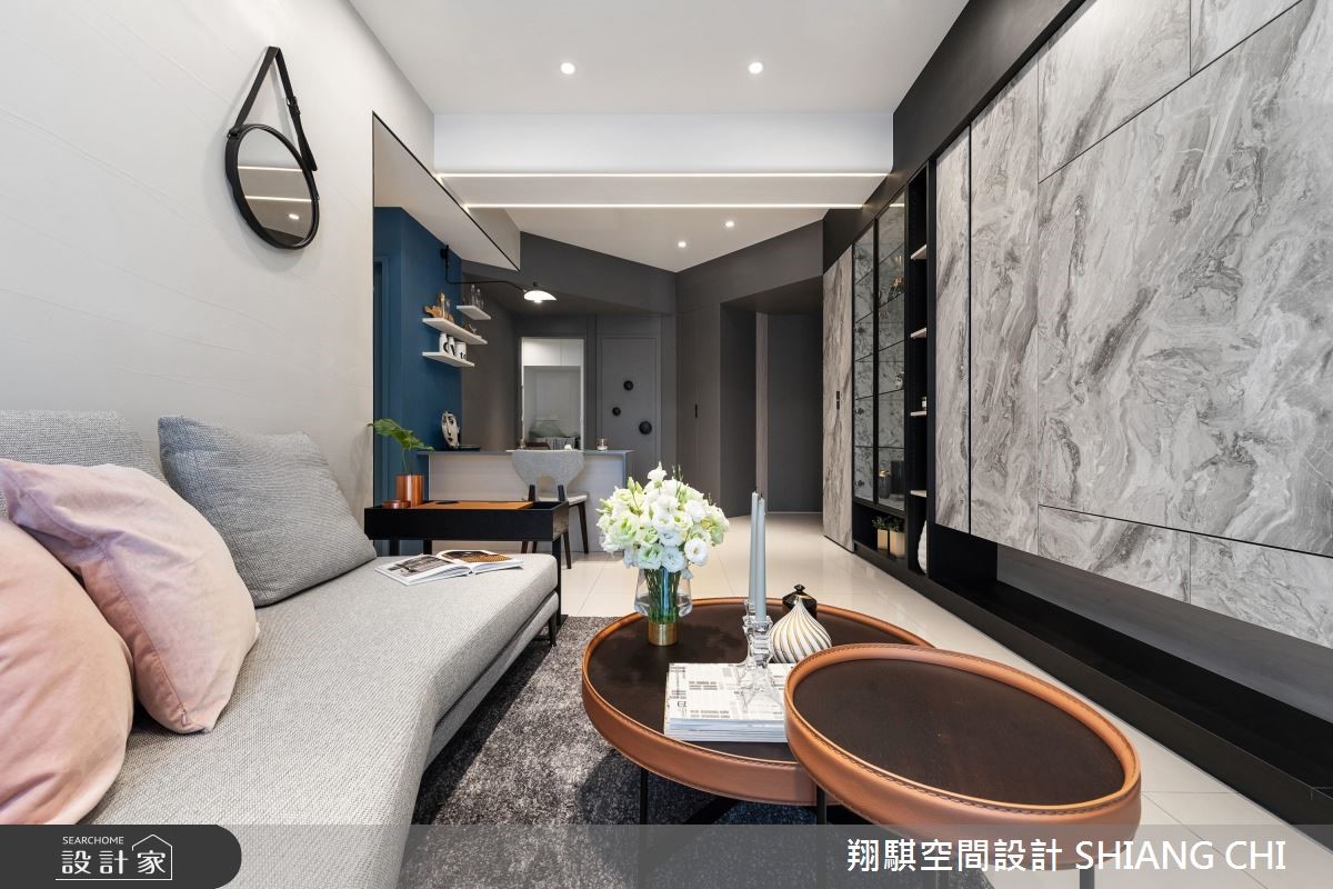 26 坪現代風居家,採以深灰色為背景,搭配輕柔的軟裝