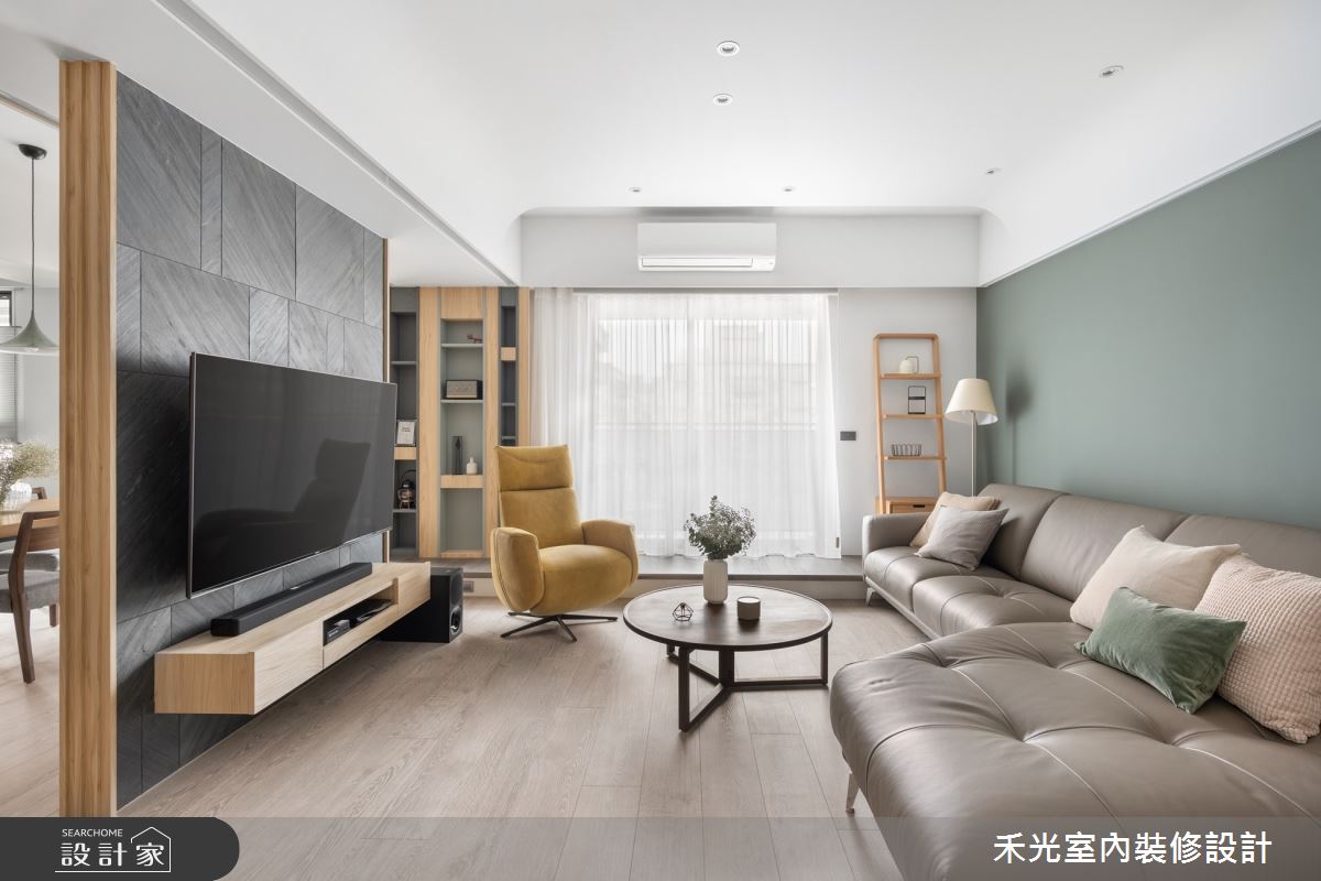 48坪的空間,一開門鋪花磚的玄關引導入內,客廳電視牆